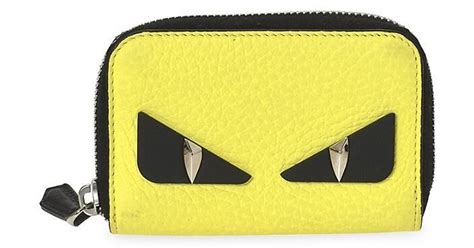 fendi wallet yellow eyes|how much is Fendi wallet.